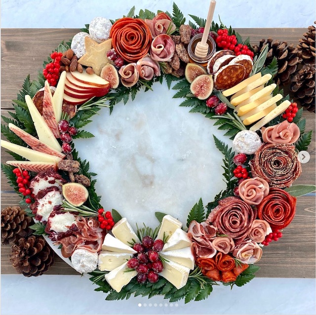 Holiday charcuterie board with salami roses