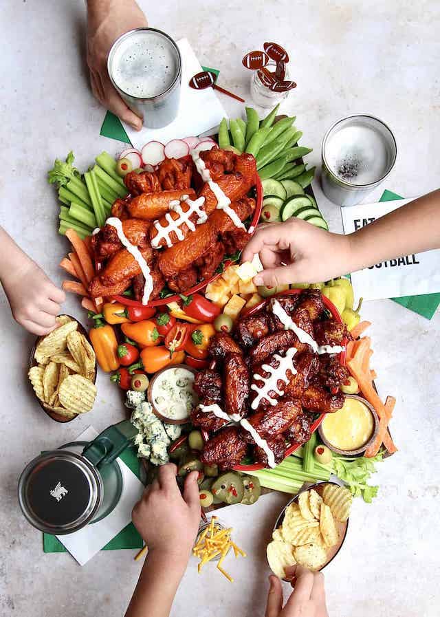 Chicken wing charcuterie board shape of football